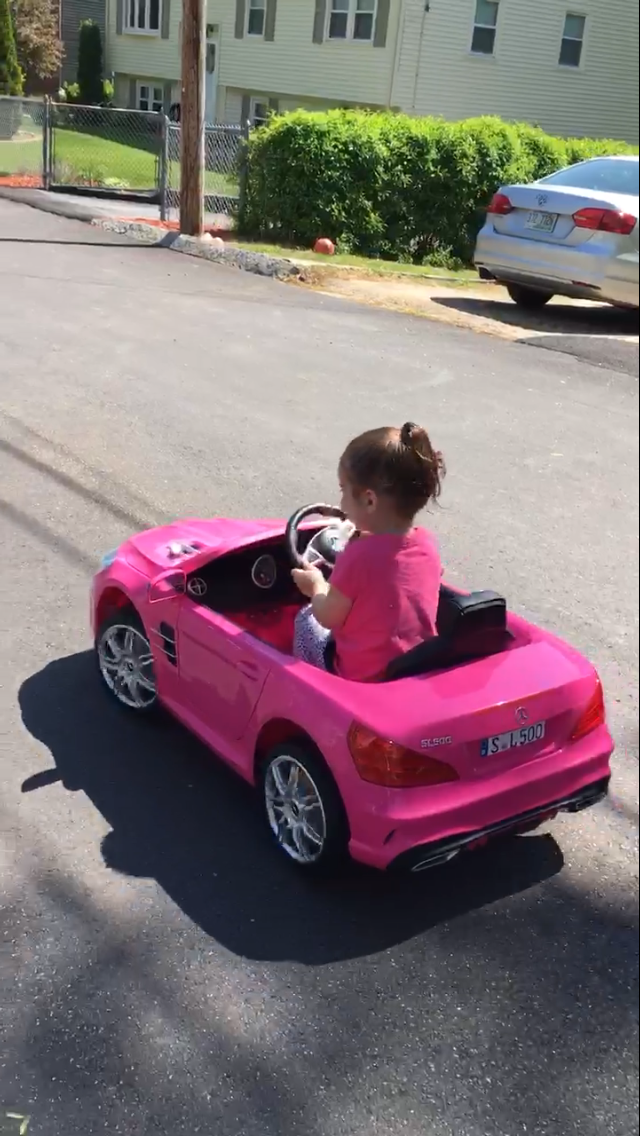 Little Girl Enjoying With Her Car